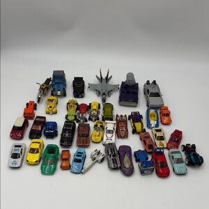 This is a lot of vintage and modern die-cast toy cars 40 pcs